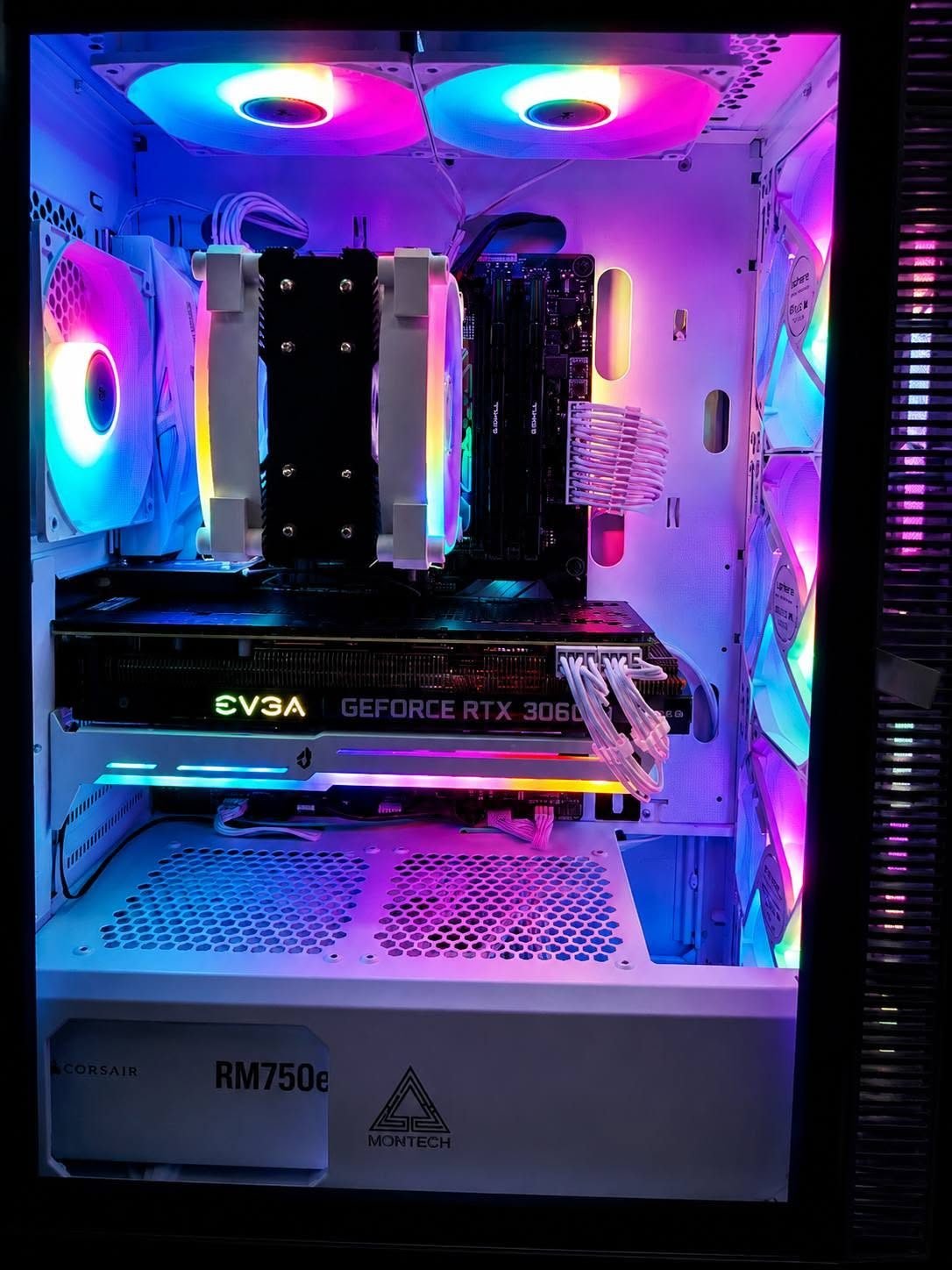 White custom PC build with rainbow RGB lighting and EVGA RTX 3060